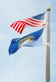 ]The majestic flags of the U.S. and Nebraska.